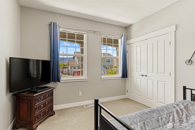 2219 Treat St SE, East Wenatchee, WA 98802 - carpeted bedroom with a closet and baseboards