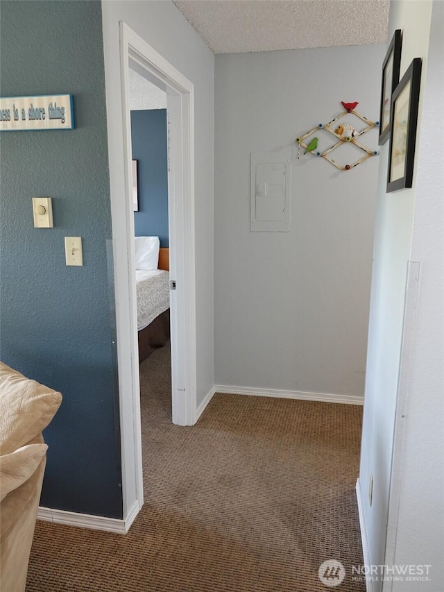 615 Ocean Shores Blvd NW Unit 115, Ocean Shores, WA 98569 - hall with carpet and baseboards
