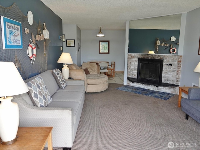 615 Ocean Shores Blvd NW Unit 115, Ocean Shores, WA 98569 - living area featuring carpet flooring and a fireplace