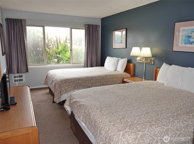 615 Ocean Shores Blvd NW Unit 115, Ocean Shores, WA 98569 - carpeted bedroom featuring baseboards