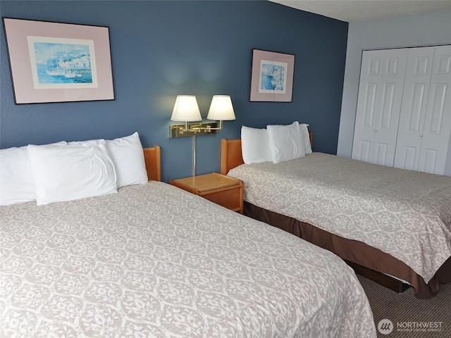 615 Ocean Shores Blvd NW Unit 115, Ocean Shores, WA 98569 - bedroom featuring a closet