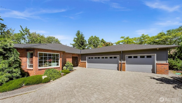 2620 Birch St, Bellingham, WA 98226 - view of front of house featuring brick siding, an attached garage, decorative driveway, and a shingled roof