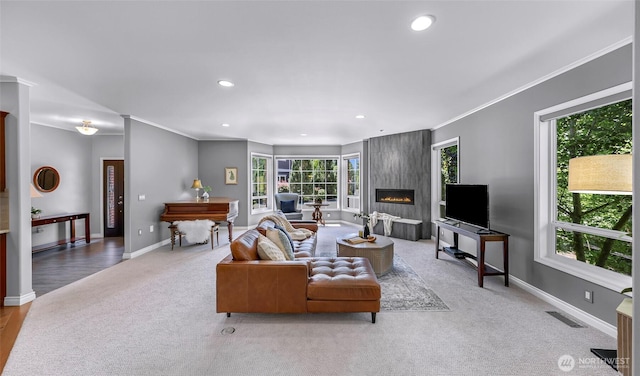 2620 Birch St, Bellingham, WA 98226 - living room with a fireplace, crown molding, recessed lighting, and light colored carpet