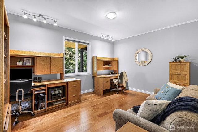 2620 Birch St, Bellingham, WA 98226 - office space with light wood-style flooring, built in study area, ornamental molding, and rail lighting