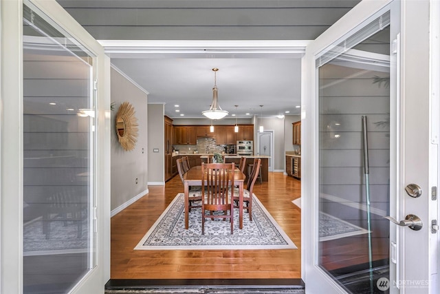 2620 Birch St, Bellingham, WA 98226 - dining area featuring wood finished floors, recessed lighting, and ornamental molding