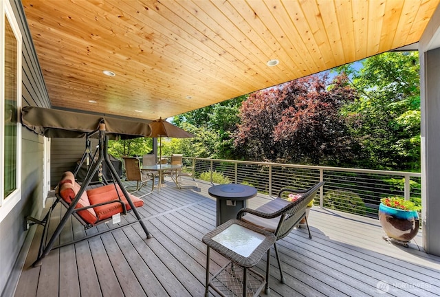 2620 Birch St, Bellingham, WA 98226 - wooden terrace with outdoor dining area