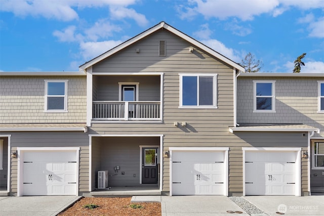 1218 E 53rd St, Tacoma, WA 98404 - multi unit property with a balcony, a garage, and driveway