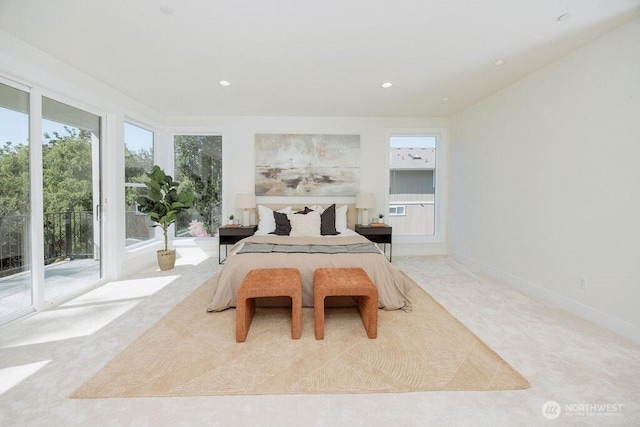 14737 56th Ave S, Tukwila, WA 98168 - carpeted bedroom featuring access to exterior and recessed lighting