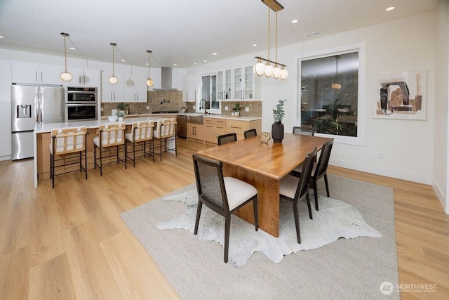 14737 56th Ave S, Tukwila, WA 98168 - dining space featuring light wood-type flooring and recessed lighting