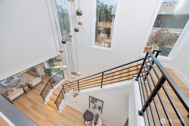 14737 56th Ave S, Tukwila, WA 98168 - stairs featuring wood finished floors and baseboards