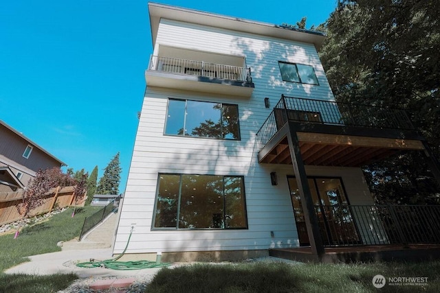 14737 56th Ave S, Tukwila, WA 98168 - rear view of property with a balcony
