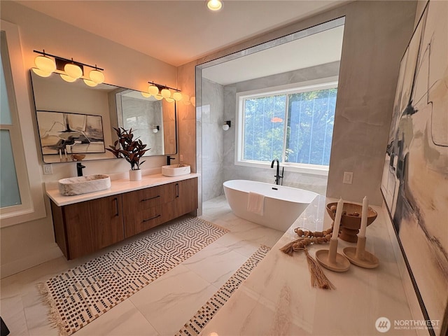 14737 56th Ave S, Tukwila, WA 98168 - bathroom featuring marble finish flooring, double vanity, and a soaking tub