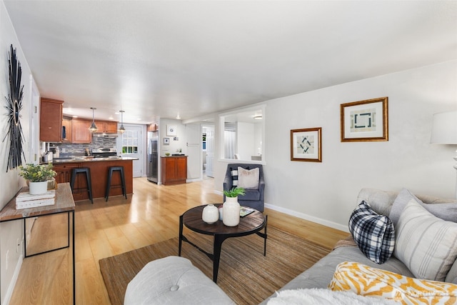 11432 11th Ave SW, Seattle, WA 98146 - living room with light wood-style floors
