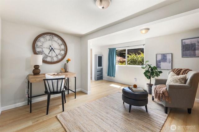 11432 11th Ave SW, Seattle, WA 98146 - sitting room featuring wood finished floors and baseboards