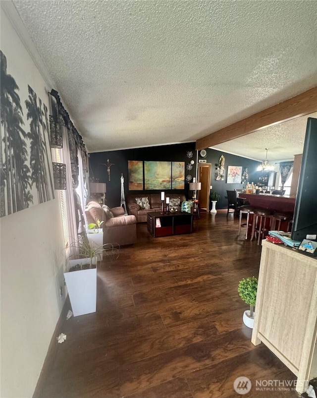 7619 156th Street Ct E Unit 9, Puyallup, WA 98375 - living area featuring a textured ceiling, wood finished floors, beam ceiling, a chandelier, and plenty of natural light