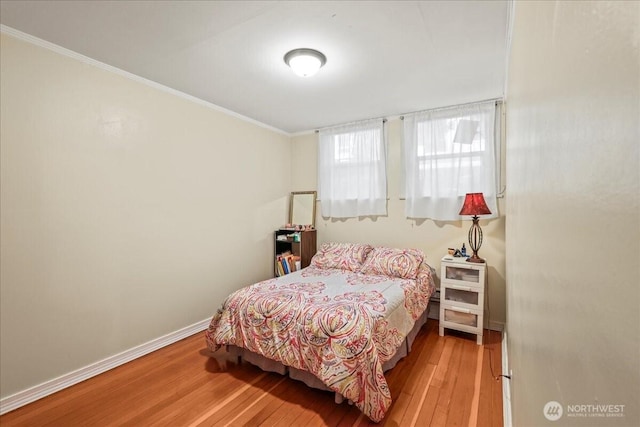 7 Harrison St Unit 5, Seattle, WA 98109 - bedroom with hardwood / wood-style floors and crown molding