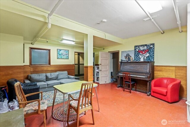 7 Harrison St Unit 5, Seattle, WA 98109 - living area with wainscoting and wood walls