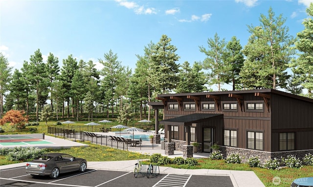 161 Plateau Loop, Cle Elum, WA 98922 - view of home's community with a pool, uncovered parking, and a patio