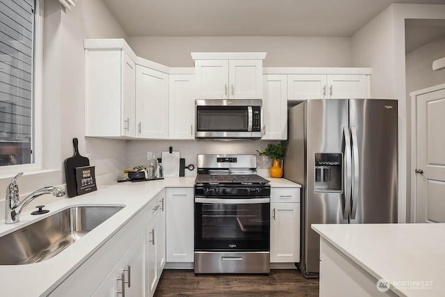 224 18th Dr Unit 96, Snohomish, WA 98290 - kitchen featuring stainless steel appliances, light countertops, and white cabinets