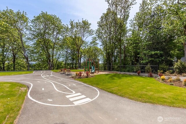 224 18th Dr Unit 96, Snohomish, WA 98290 - view of property's community featuring a yard and view of wooded area