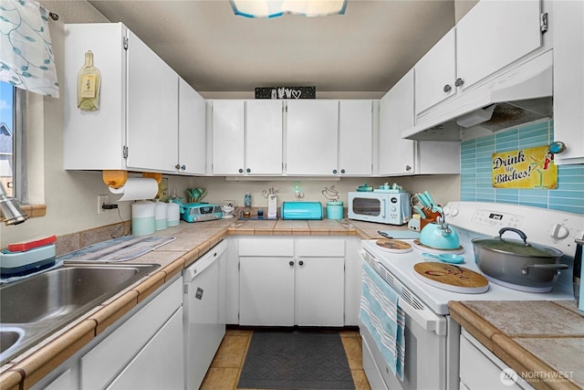 11613 63rd Street Ct E, Puyallup, WA 98372 - kitchen featuring white appliances, under cabinet range hood, white cabinetry, and light countertops