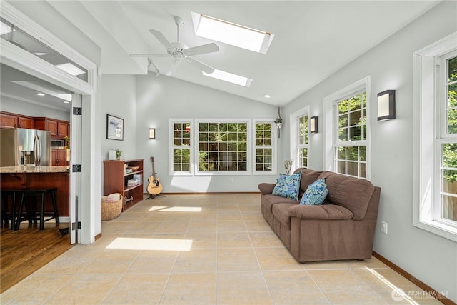 30449 103rd Ct SE, Auburn, WA 98092 - living area featuring a skylight, lofted ceiling, ceiling fan, and light tile patterned floors