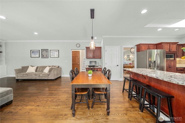 30449 103rd Ct SE, Auburn, WA 98092 - dining space featuring crown molding, recessed lighting, and dark wood-type flooring