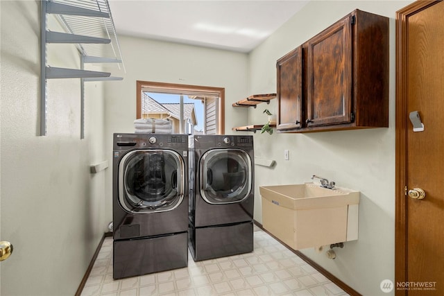 30449 103rd Ct SE, Auburn, WA 98092 - laundry room with light flooring, cabinet space, and washing machine and clothes dryer