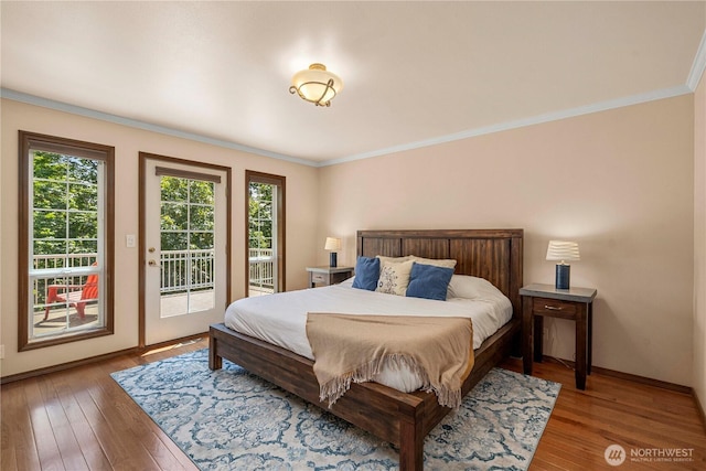 30449 103rd Ct SE, Auburn, WA 98092 - bedroom with access to exterior, ornamental molding, and wood-type flooring