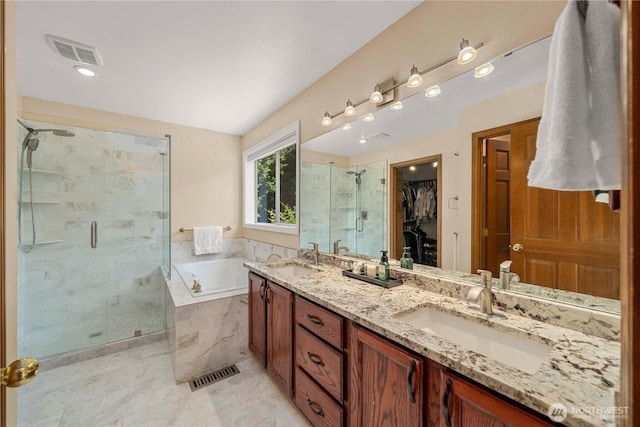 30449 103rd Ct SE, Auburn, WA 98092 - bathroom featuring a shower stall, a bath, a spacious closet, and double vanity
