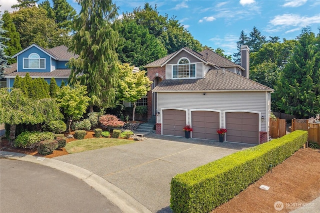 30449 103rd Ct SE, Auburn, WA 98092 - view of front of house featuring driveway, brick siding, a chimney, and a garage