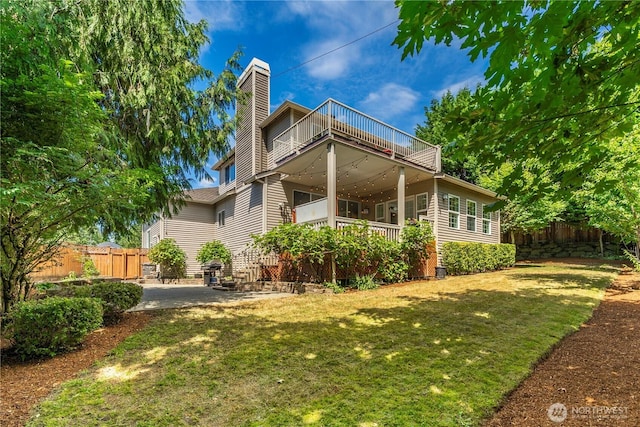 30449 103rd Ct SE, Auburn, WA 98092 - back of property featuring a balcony, a chimney, and a patio
