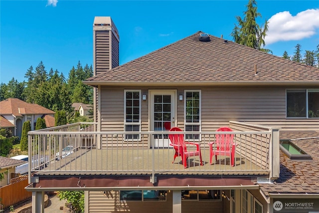 30449 103rd Ct SE, Auburn, WA 98092 - back of property featuring a balcony, a chimney, and roof with shingles