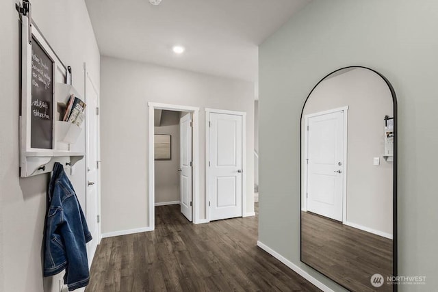 214 18th Dr Unit 100, Snohomish, WA 98290 - hallway featuring dark wood-style floors, a barn door, and recessed lighting
