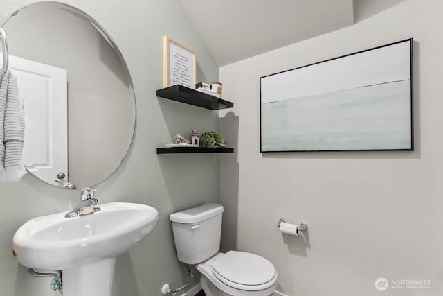 214 18th Dr Unit 100, Snohomish, WA 98290 - bathroom with toilet and lofted ceiling