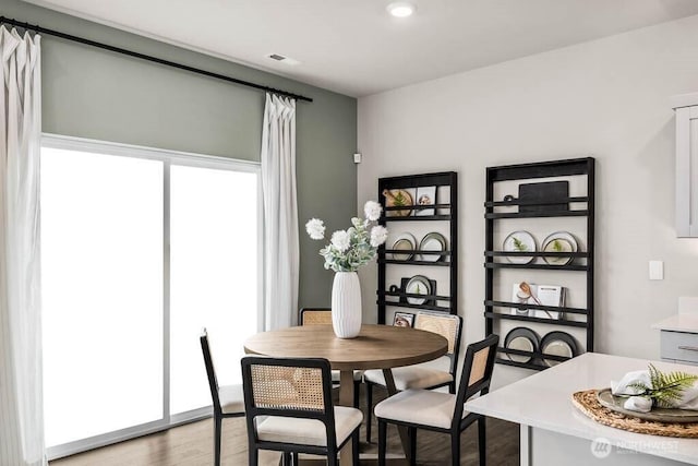 214 18th Dr Unit 100, Snohomish, WA 98290 - dining space with wood finished floors and recessed lighting