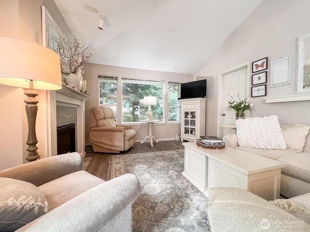 38774 SE Beta, Unit Snoqualmie, WA 98065 - living room with a fireplace, lofted ceiling, and wood finished floors