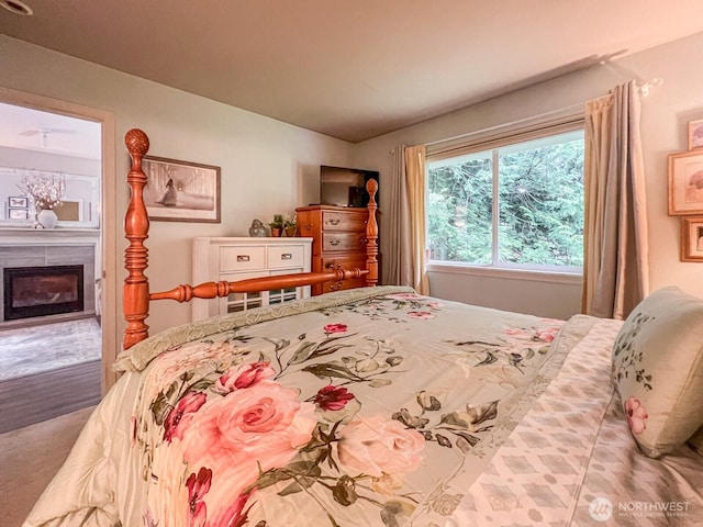 38774 SE Beta, Unit Snoqualmie, WA 98065 - bedroom featuring a glass covered fireplace