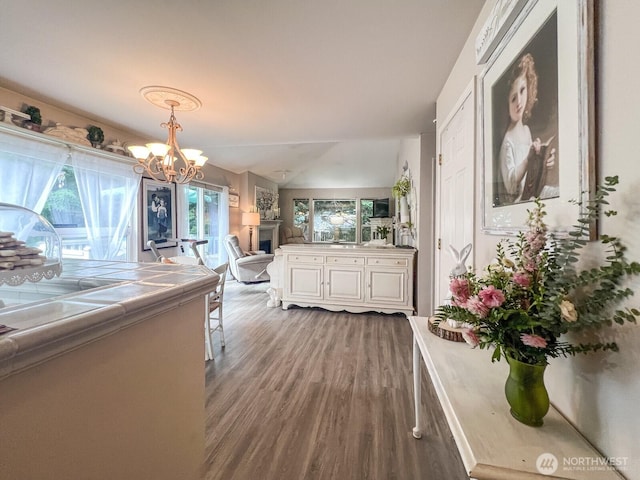 38774 SE Beta, Unit Snoqualmie, WA 98065 - corridor with a chandelier, wood finished floors, and lofted ceiling