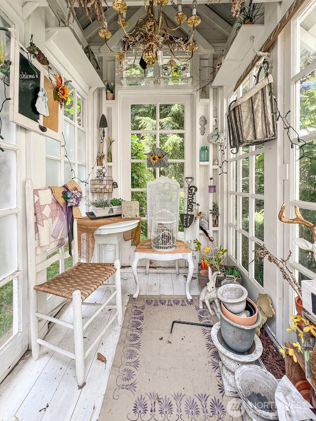 38774 SE Beta, Unit Snoqualmie, WA 98065 - sunroom with plenty of natural light, a chandelier, and wood finished floors