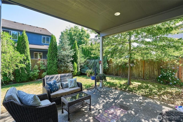 12235 SE 253rd St, Kent, WA 98030 - fenced backyard featuring a patio and outdoor lounge area