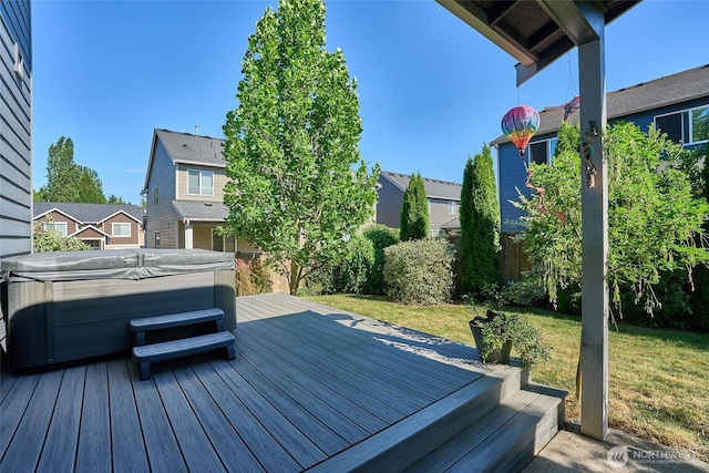 12235 SE 253rd St, Kent, WA 98030 - wooden deck featuring a hot tub and a lawn