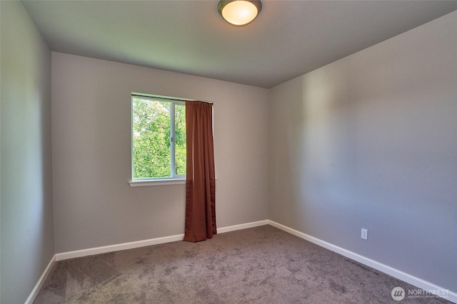 12235 SE 253rd St, Kent, WA 98030 - carpeted spare room with baseboards