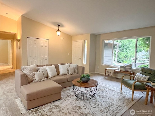 104 Puget Loop, Port Ludlow, WA 98365 - living room featuring carpet and lofted ceiling