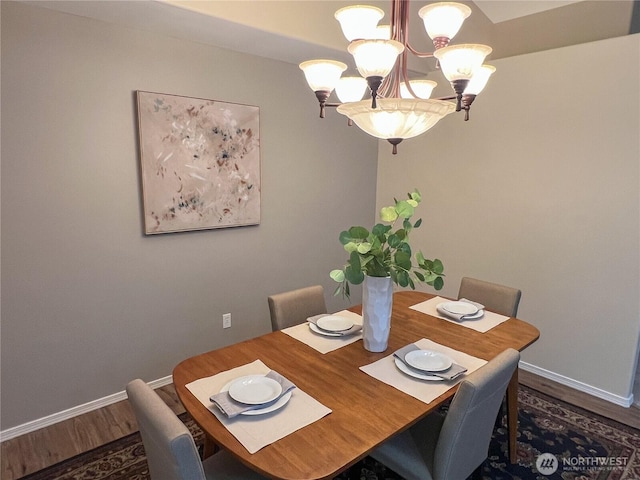 104 Puget Loop, Port Ludlow, WA 98365 - dining area with a chandelier and wood finished floors