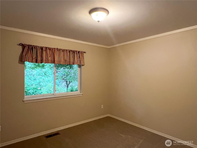 104 Puget Loop, Port Ludlow, WA 98365 - spare room with crown molding and dark colored carpet