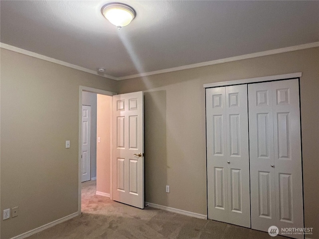 104 Puget Loop, Port Ludlow, WA 98365 - unfurnished bedroom featuring carpet floors, a closet, and ornamental molding
