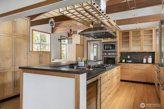 222 Rhodena Dr, Coupeville, WA 98239 - kitchen with stainless steel appliances, beamed ceiling, wine cooler, dark countertops, and exhaust hood