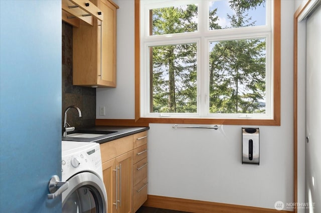 222 Rhodena Dr, Coupeville, WA 98239 - laundry area with washer / clothes dryer and cabinet space