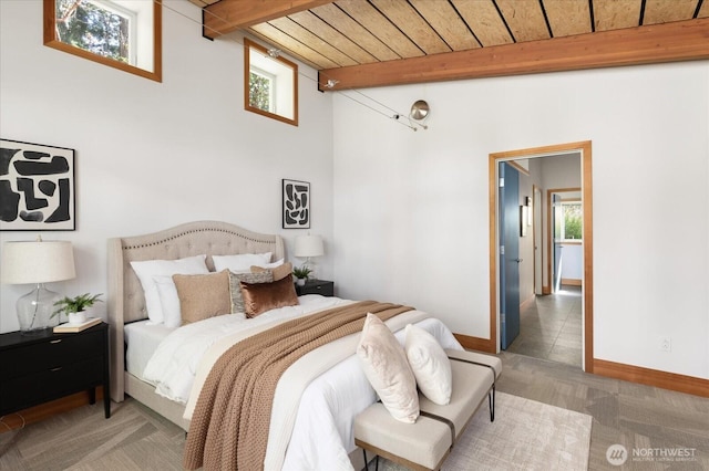 222 Rhodena Dr, Coupeville, WA 98239 - bedroom with carpet flooring and a wood ceiling with exposed beams